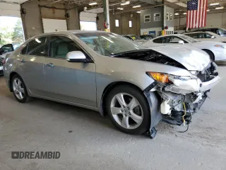 2010 Acura TSX с VIN JH4CU2F61AC028199, выставлен на аукционе Copart как лот 62156685 с пробегом 129 677 миль миль и Списание • Salvage title. История ставок и продаж доступна на DreamBid. Изображение 4.