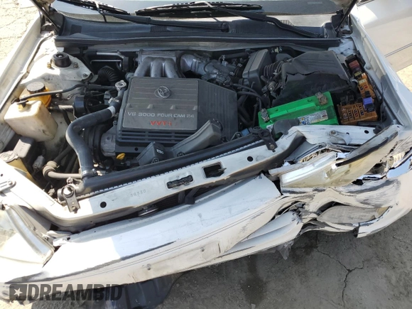 2000 Toyota Avalon XL with VIN 4T1BF28B9YU068001, listed as a Copart auction lot 54958915 with 240,232 mi miles and Salvage Title. Bid and sale history available at DreamBid. Image 11.
