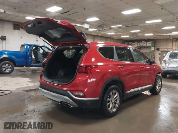2019 Hyundai Santa Fe SE z VIN 5NMS2CAD3KH125454, wystawiony jako IAAI lot #42400534 z przebiegiem 75 155 mil mil oraz . Historia ofert i sprzedaży dostępna na DreamBid. Obrazek 4.