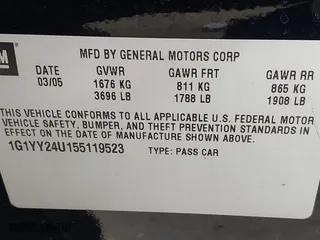 2005 Chevrolet Corvette with VIN 1G1YY24U155119523, listed as a IAAI auction lot 41870761 with 103,986 mi miles. Bid and sale history available at carsss.com. Image 9.
