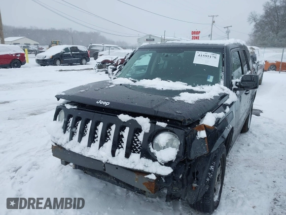2014 Jeep Patriot Sport with VIN 1C4NJRBB2ED841808, listed as a IAAI auction lot 41595178 with 146,323 mi miles and . Bid and sale history available at DreamBid. Image 2.