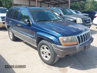 2001 Jeep Grand Cherokee Laredo with VIN 1J4GW48NX1C559201, listed as a IAAI auction lot 42769999 with 184,633 mi miles and . Bid and sale history available at DreamBid. Image 1.