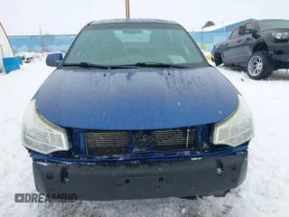 2008 Ford Focus SE with VIN 1FAHP35N58W185875, listed as a IAAI auction lot 41569411 with 185,579 mi miles. Bid and sale history available at carsss.com. Image 6.