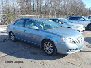 2009 Toyota Avalon XL with VIN 4T1BK36B19U350297, listed as a IAAI auction lot 41589714 with 141,003 mi miles. Bid and sale history available at carsss.com. Image 1.