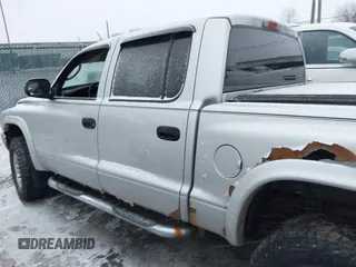 2004 Dodge Dakota SLT with VIN 1D7HG48N34S665027, listed as a IAAI auction lot 41395509 with 128,064 mi miles. Bid and sale history available at carsss.com. Image 14.