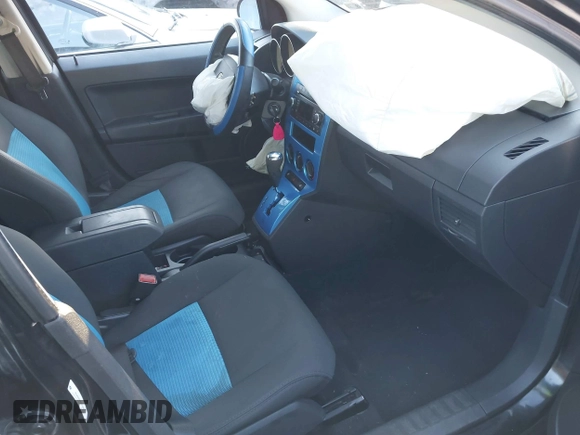 2009 Dodge Caliber SXT with VIN 1B3HB48A89D118869, listed as a IAAI auction lot 41315552 with 198,986 mi miles and . Bid and sale history available at DreamBid. Image 5.