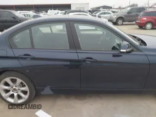 2015 BMW 3 Series 328i xDrive with VIN WBA3B3C54FJ984107, listed as a IAAI auction lot 41565829 with 98,557 mi miles and . Bid and sale history available at DreamBid. Image 14.