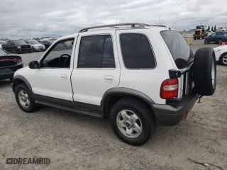 2002 Kia Sportage with VIN KNDJB723725141748, listed as a Copart auction lot 53556945 with 96,535 mi miles and Clean Title. Bid and sale history available at carsss.com. Image 2.