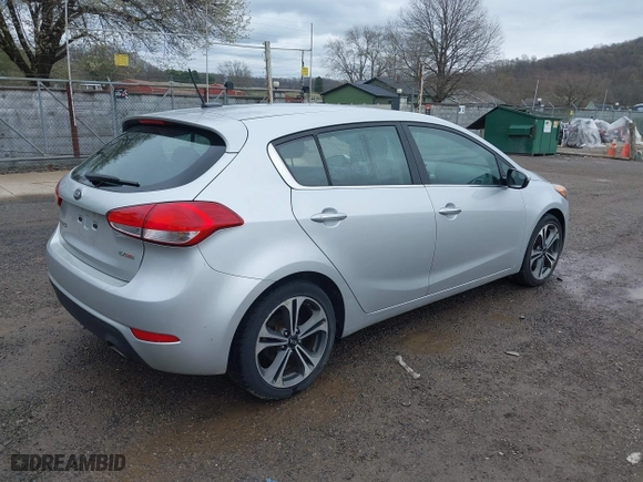 2016 Kia Forte 5-Door EX with VIN KNAFX5A85G5496365, listed as a IAAI auction lot 41920359 with 127,907 mi miles. Bid and sale history available at carsss.com. Image 4.
