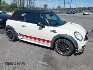 2010 MINI Convertible S with VIN WMWMS3C57ATY51245, listed as a IAAI auction lot 41802174 with 110,154 mi miles and . Bid and sale history available at DreamBid. Image 1.