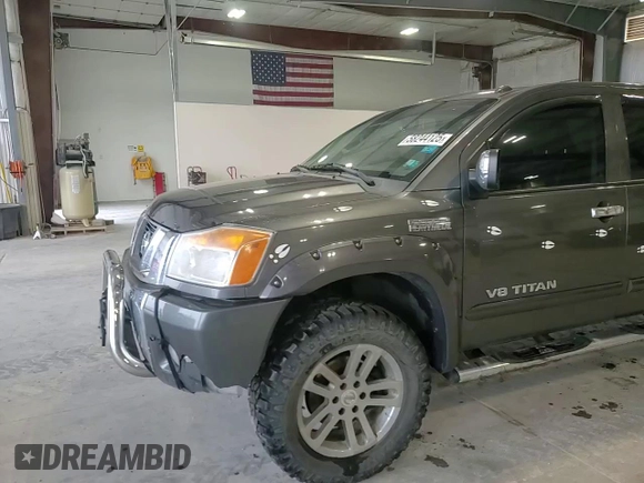 2012 Nissan Titan SL with VIN 1N6BA0ECXCN300562, listed as a Copart auction lot 58244125 with 131,595 mi miles and Salvage title. Bid and sale history available at DreamBid. Image 14.