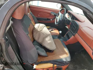 2000 Porsche Boxster z VIN WP0CA2988YU627807, wystawiony jako Copart lot #45522955 z przebiegiem 120 384 mil mil oraz Szkody całkowita. Historia ofert i sprzedaży dostępna na DreamBid. Obrazek 10.