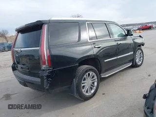 2016 Cadillac Escalade z VIN 1GYS4AKJ5GR411967, wystawiony jako IAAI lot #41848021 z przebiegiem 120 579 mil mil oraz . Historia ofert i sprzedaży dostępna na DreamBid. Obrazek 4.