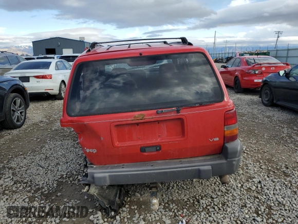 1996 Jeep Grand Cherokee Laredo with VIN 1J4GZ58Y0TC162591, listed as a Copart auction lot 43027025 with 383,318 mi miles and Salvage Title. Bid and sale history available at carsss.com. Image 6.