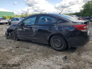 2017 Subaru Impreza with VIN 4S3GKAA6XH1607837, listed as a Copart auction lot 58811274 with 77,327 mi miles and Salvage Title. Bid and sale history available at carsss.com. Image 2.