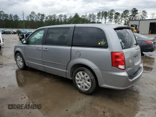 2014 Dodge Grand Caravan SE with VIN 2C4RDGBG3ER426969, listed as a Copart auction lot 43592225 with 135,423 mi miles and Salvage Title. Bid and sale history available at DreamBid. Image 2.