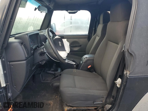 2006 Jeep Wrangler X with VIN 1J4FA39S26P709262, listed as a Copart auction lot 67327484 with 113,687 mi miles and Salvage Title. Bid and sale history available at carsss.com. Image 7.