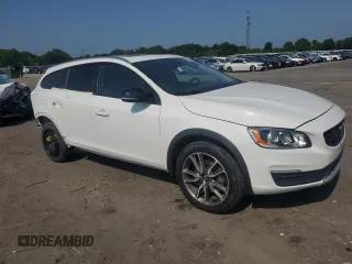 2018 Volvo V60 with VIN YV440MWKXJ2059075, listed as a Copart auction lot 60654775 with 58,040 mi miles and Salvage title. Bid and sale history available at DreamBid. Image 4.