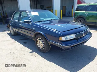 1996 Oldsmobile Cutlass Ciera 1SA VX5 z VIN 1G3AJ55M6T6397371, wystawiony jako IAAI lot #42222459 z przebiegiem 92 232 mil mil oraz . Historia ofert i sprzedaży dostępna na DreamBid. Obrazek 1.