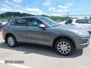2014 Porsche Cayenne z VIN WP1AA2A2XELA91523, wystawiony jako IAAI lot #42538298 z przebiegiem 67 001 mil mil oraz . Historia ofert i sprzedaży dostępna na DreamBid. Obrazek 13.