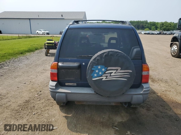 2004 Chevrolet Tracker ZR2 z VIN 2CNBJ734346903751, wystawiony jako Copart lot #59300765 z przebiegiem 126 924 mil mil oraz Szkoda całkowita • Salvage title. Historia ofert i sprzedaży dostępna na DreamBid. Obrazek 6.