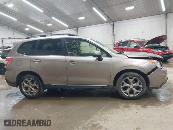 2015 Subaru Forester Touring with VIN JF2SJAUC6FH455446, listed as a IAAI auction lot 42095963 with 152,545 mi miles and . Bid and sale history available at DreamBid. Image 13.