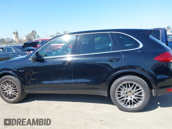 2012 Porsche Cayenne S Hybrid with VIN WP1AE2A23CLA93096, listed as a IAAI auction lot 41972843 with 79,139 mi miles. Bid and sale history available at carsss.com. Image 14.
