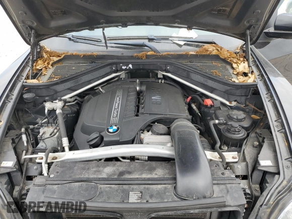 2012 BMW X5 35i with VIN 5UXZV4C50CL750118, listed as a Copart auction lot 53302375 with 102,917 mi miles and Clean title. Bid and sale history available at DreamBid. Image 12.