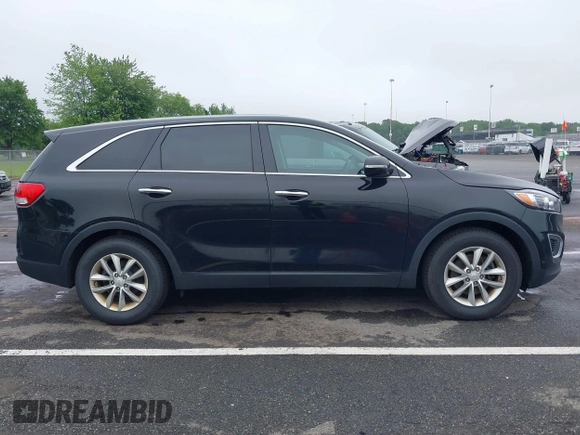 2018 Kia Sorento LX z VIN 5XYPG4A37JG412910, wystawiony jako IAAI lot #42466741 z przebiegiem 170 131 mil mil oraz . Historia ofert i sprzedaży dostępna na DreamBid. Obrazek 13.