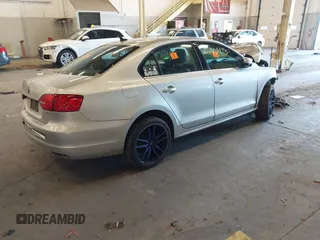 2013 Volkswagen Jetta TDI w/Premium with VIN 3VWLL7AJ5DM402469, listed as a IAAI auction lot 41703173 with Not provided miles and . Bid and sale history available at DreamBid. Image 4.