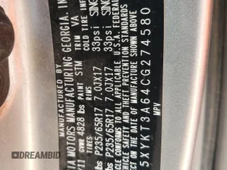 2012 Kia Sorento LX z VIN 5XYKT3A64CG274580, wystawiony jako Copart lot #55513455 z przebiegiem 167 369 mil mil oraz Szkoda całkowita • Salvage title. Historia ofert i sprzedaży dostępna na DreamBid. Obrazek 13.