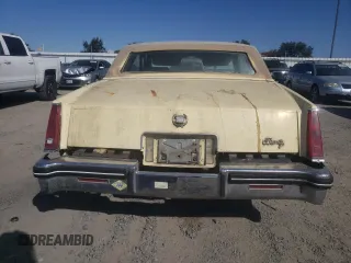 1982 Cadillac Eldorado z VIN 1G6AL578XCE608090, wystawiony jako Copart lot #73839654 z przebiegiem 22 185 mil mil oraz Czysty tytuł • Clean title. Historia ofert i sprzedaży dostępna na DreamBid. Obrazek 6.