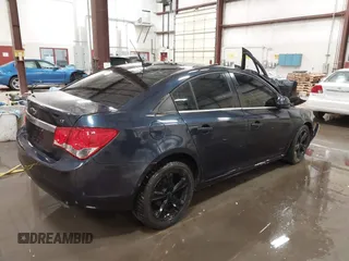 2014 Chevrolet Cruze 2LT z VIN 1G1PE5SB2E7120465, wystawiony jako IAAI lot #41672988 z przebiegiem Nie podano mil oraz . Historia ofert i sprzedaży dostępna na DreamBid. Obrazek 4.