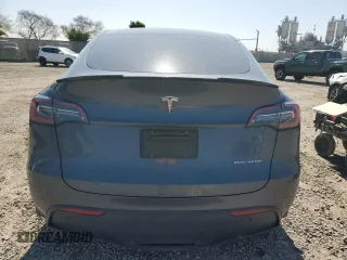 2023 Tesla Model Y Long Range with VIN 7SAYGDEE2PA164405, listed as a Copart auction lot 50085905 with 42,156 mi miles and Salvage Title. Bid and sale history available at DreamBid. Image 6.