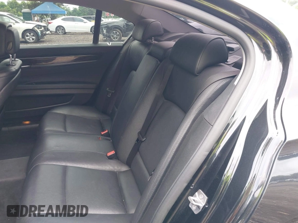 2015 BMW 7 Series 740Li xDrive with VIN WBAYF4C55FG291723, listed as a IAAI auction lot 42694382 with 101,140 mi miles and . Bid and sale history available at DreamBid. Image 8.