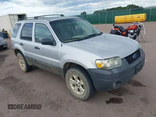 2006 Ford Escape XLT with VIN 1FMYU93186KC23802, listed as a IAAI auction lot 42611582 with 166,871 mi miles and . Bid and sale history available at DreamBid. Image 1.