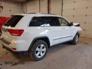 2011 Jeep Grand Cherokee 70th Anniversary with VIN 1J4RR4GG4BC702759, listed as a IAAI auction lot 41871604 with 143,583 mi miles. Bid and sale history available at carsss.com. Image 4.
