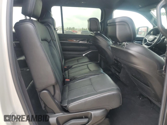2022 Jeep Wagoneer Series III with VIN 1C4SJVDT9NS212446, listed as a Copart auction lot 55009165 with 61,788 mi miles and Salvage Title. Bid and sale history available at DreamBid. Image 11.