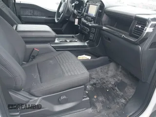 2023 Ford F-150 XL with VIN 1FTEW1EP5PFB87582, listed as a IAAI auction lot 42254015 with 10,476 mi miles and . Bid and sale history available at DreamBid. Image 5.