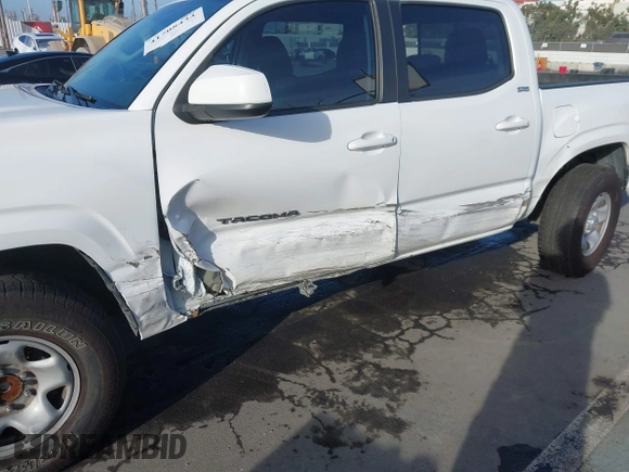 2017 Toyota Tacoma SR with VIN 5TFAX5GN4HX092764, listed as a IAAI auction lot 41708434 with 114,607 mi miles. Bid and sale history available at carsss.com. Image 6.
