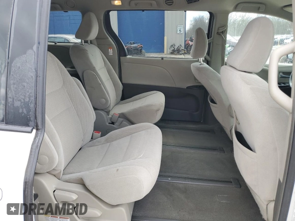 2016 Toyota Sienna LE with VIN 5TDJK3DC3GS131175, listed as a Copart auction lot 52520595 with 107,001 mi miles and Salvage Title. Bid and sale history available at carsss.com. Image 11.
