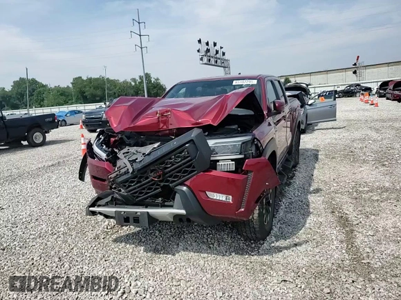 2022 Nissan Frontier Pro-4X with VIN 1N6ED1EK1NN601886, listed as a Copart auction lot 65182295 with 51,879 mi miles and Salvage title. Bid and sale history available at DreamBid. Image 13.