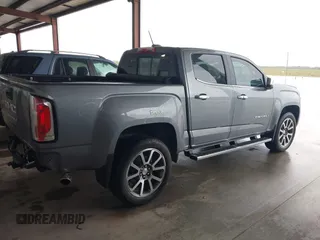2022 GMC Canyon 2WD Denali with VIN 1GTG5EEN4N1114408, listed as a IAAI auction lot 41908815 with 34,730 mi miles. Bid and sale history available at carsss.com. Image 4.