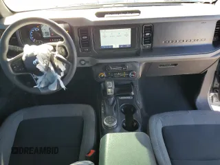 2023 Ford Bronco z VIN 1FMDE5CP7PLB26062, wystawiony jako Copart lot #76208154 z przebiegiem 17 688 mil mil oraz Szkoda całkowita • Salvage title. Historia ofert i sprzedaży dostępna na DreamBid. Obrazek 8.
