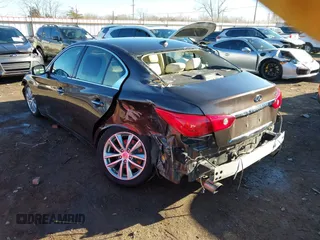 2014 Infiniti Q50 Hybrid Sport with VIN JN1AV7AP3EM691473, listed as a IAAI auction lot 41348911 with 128,851 mi miles and . Bid and sale history available at DreamBid. Image 6.