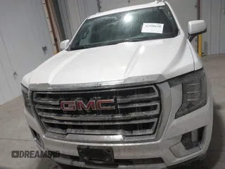 2021 GMC Yukon XL SLT with VIN 1GKS2GKD4MR414318, listed as a IAAI auction lot 41590618 with 49,913 mi miles. Bid and sale history available at carsss.com. Image 12.