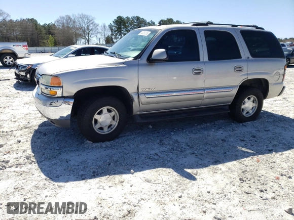 2005 GMC Yukon SLT z VIN 1GKEC13T95R103031, wystawiony jako Copart lot #48339205 z przebiegiem 268 183 mil mil oraz Szkoda całkowita • Salvage title. Historia ofert i sprzedaży dostępna na DreamBid. Obrazek 1.