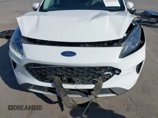 2021 Ford Escape SE Hybrid with VIN 1FMCU9BZ4MUA68247, listed as a IAAI auction lot 42353179 with 132,651 mi miles and . Bid and sale history available at DreamBid. Image 6.