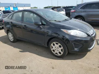 2012 Ford Fiesta SE with VIN 3FADP4BJ3CM118089, listed as a Copart auction lot 68630084 with 49,010 mi miles and Salvage Title. Bid and sale history available at DreamBid. Image 4.
