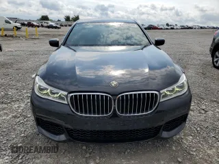 2016 BMW 7 Series 750i with VIN WBA7F0C53GGM20760, listed as a Copart auction lot 57230334 with 77,588 mi miles and Salvage Title. Bid and sale history available at carsss.com. Image 5.